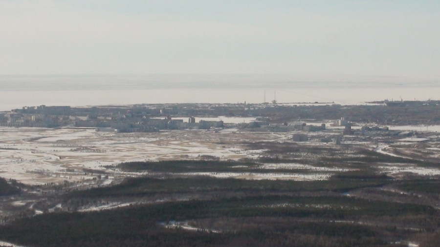 город